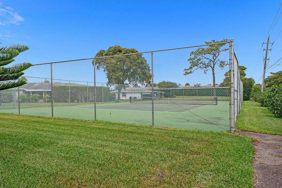 2820 Southwest 13th Street, Unit 101 Delray Beach, FL 33445 - Photo 78 of 83 One of the pickleball/tennis courts