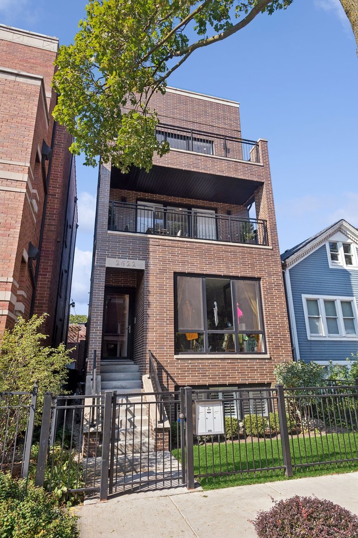 a view of a building with a street