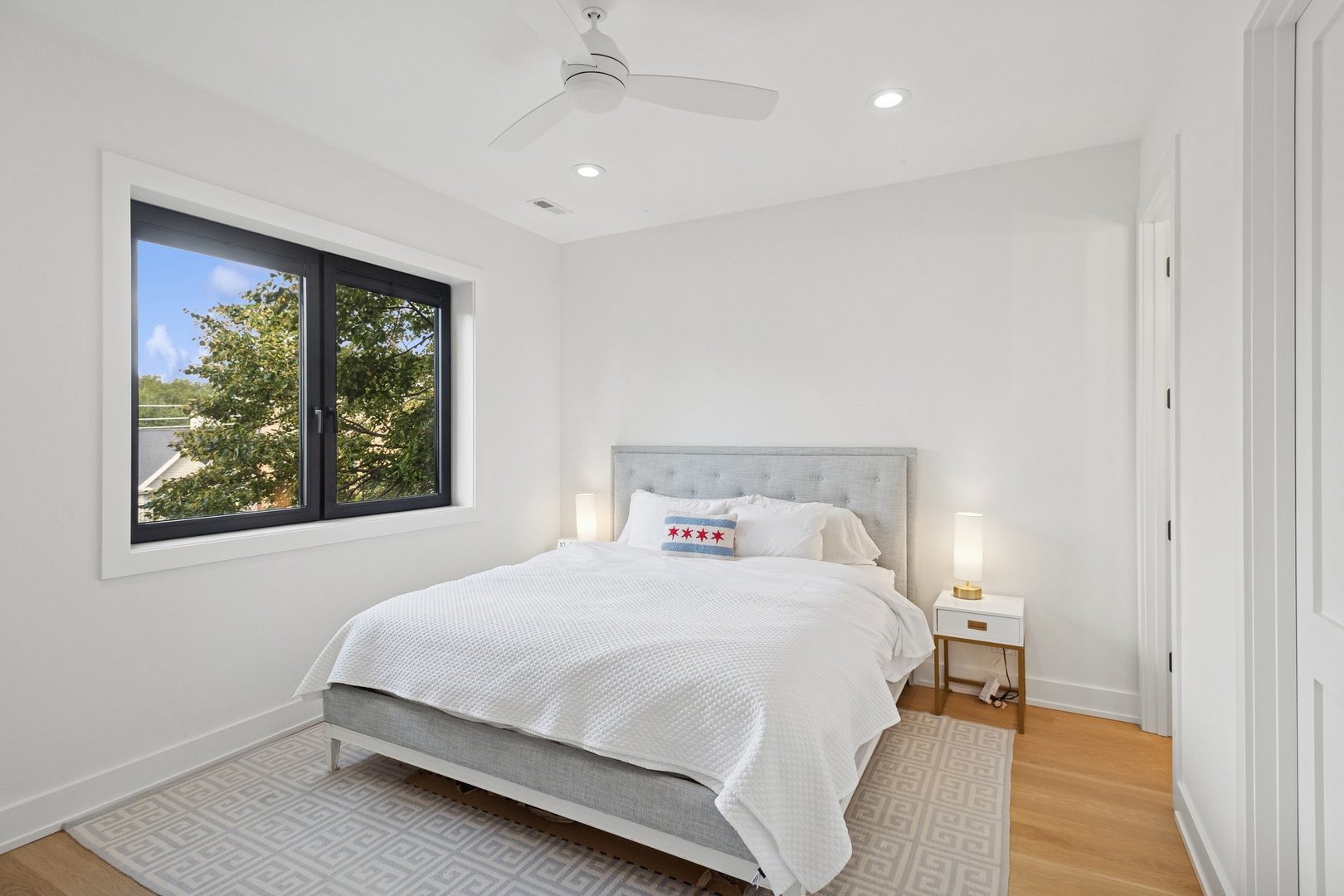 2622 North Racine Avenue, Unit 3 Chicago, IL 60614 - Photo 11 of 28 a bedroom with a bed and a window