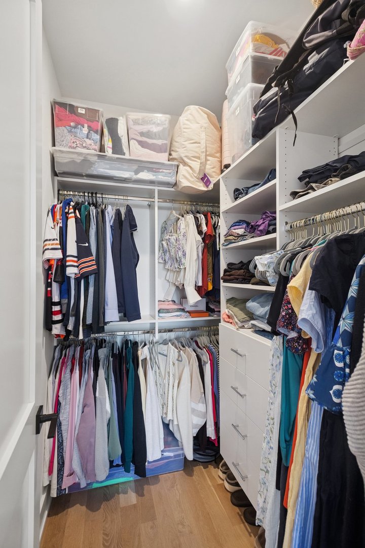 2622 North Racine Avenue, Unit 3 Chicago, IL 60614 - Photo 14 of 28 a view of walk in closet with clothes and shoes