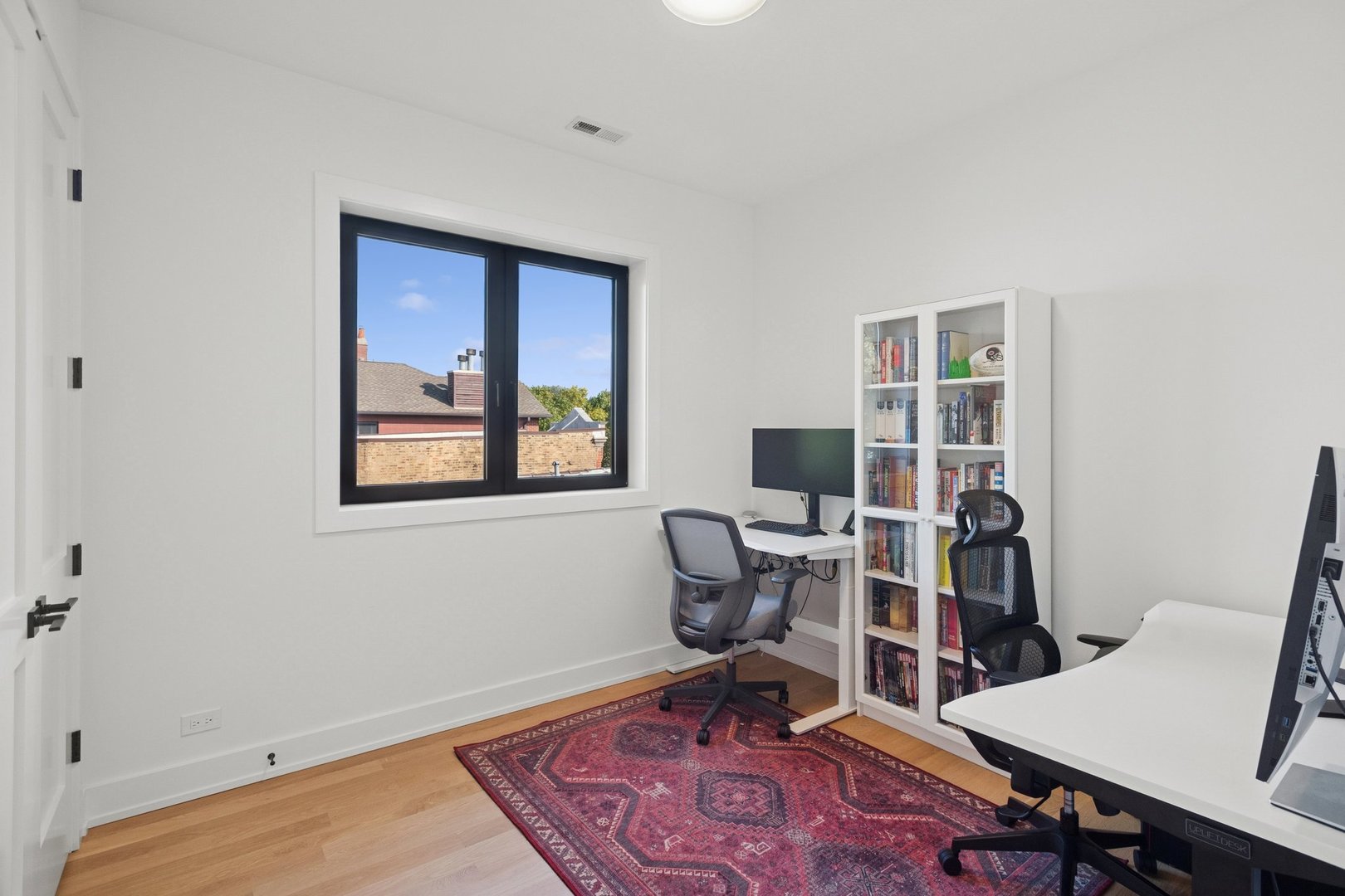 2622 North Racine Avenue, Unit 3 Chicago, IL 60614 - Photo 15 of 28 a view of a workspace with furniture and a workspace