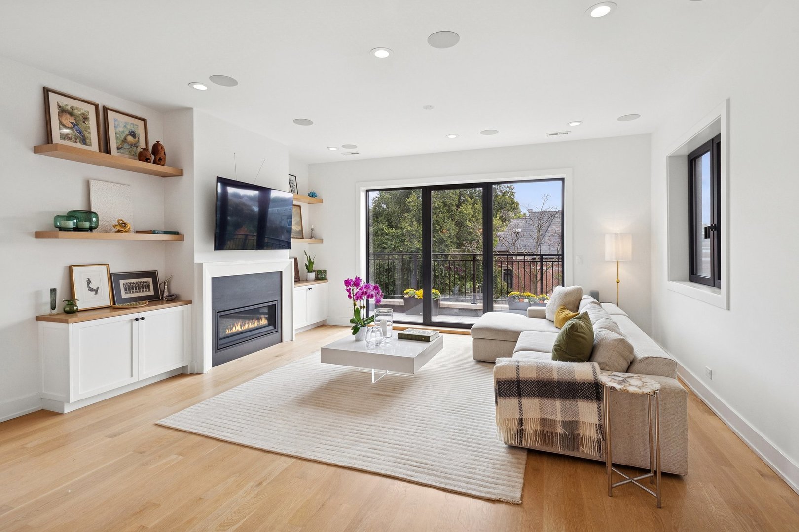 2622 North Racine Avenue, Unit 3 Chicago, IL 60614 - Photo 3 of 28 a living room with furniture fireplace and flat screen tv
