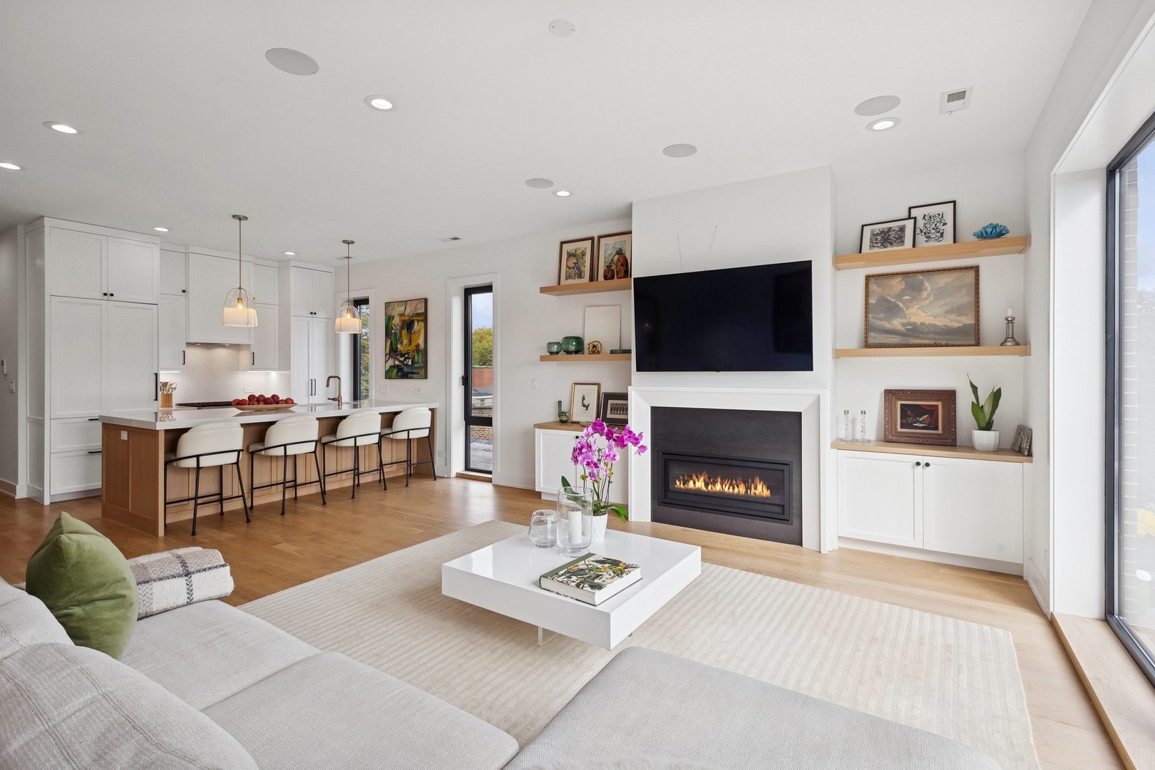 2622 North Racine Avenue, Unit 3 Chicago, IL 60614 - Photo 4 of 28 a living room with furniture a fireplace and a flat screen tv