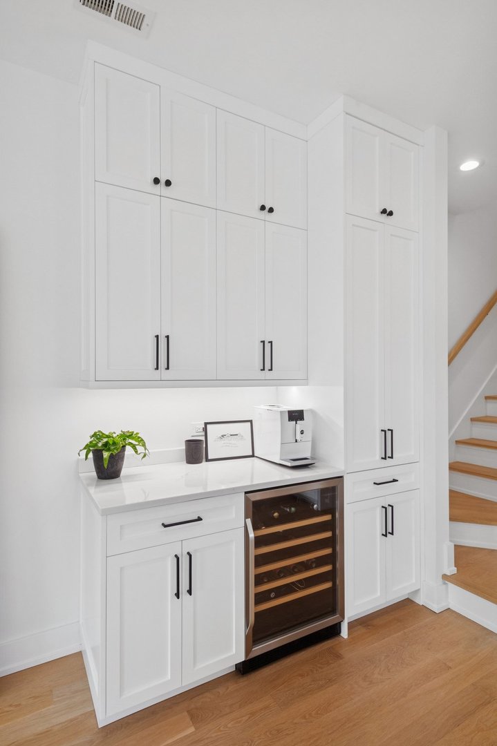 2622 North Racine Avenue, Unit 3 Chicago, IL 60614 - Photo 9 of 28 a kitchen with stainless steel appliances cabinets and a wooden floor