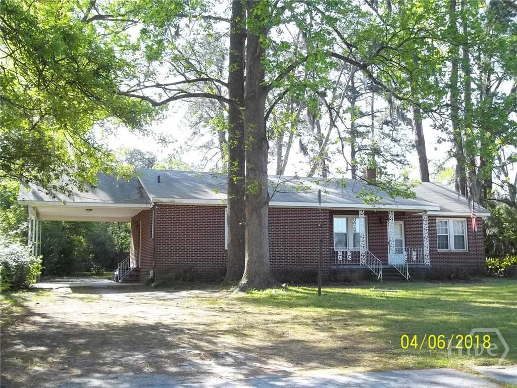 141 Rommel Avenue Savannah, GA 31408 - Photo 1 of 16 Front with carport