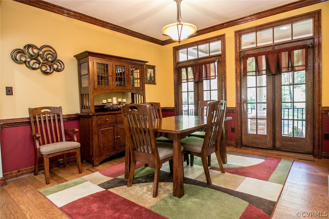 7365 Cedarcrest Road Hanover, VA 23069 - Photo 13 of 50 a view of a dining room with furniture window and wooden floor