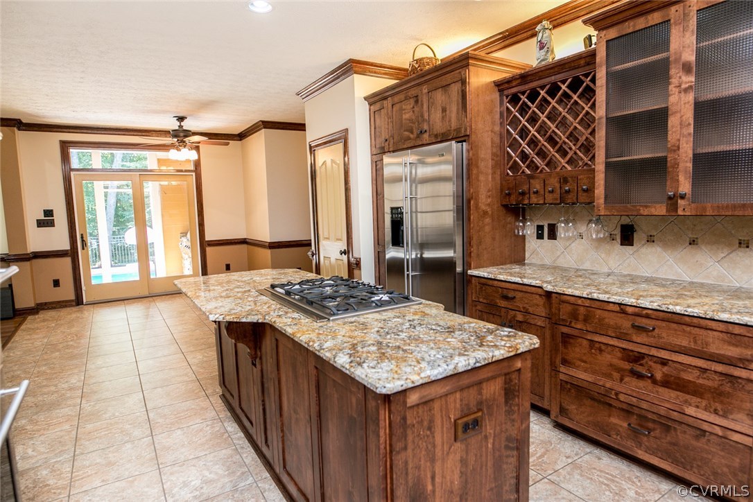 7365 Cedarcrest Road Hanover, VA 23069 - Photo 18 of 50 a kitchen with a stove and a wooden cabinets