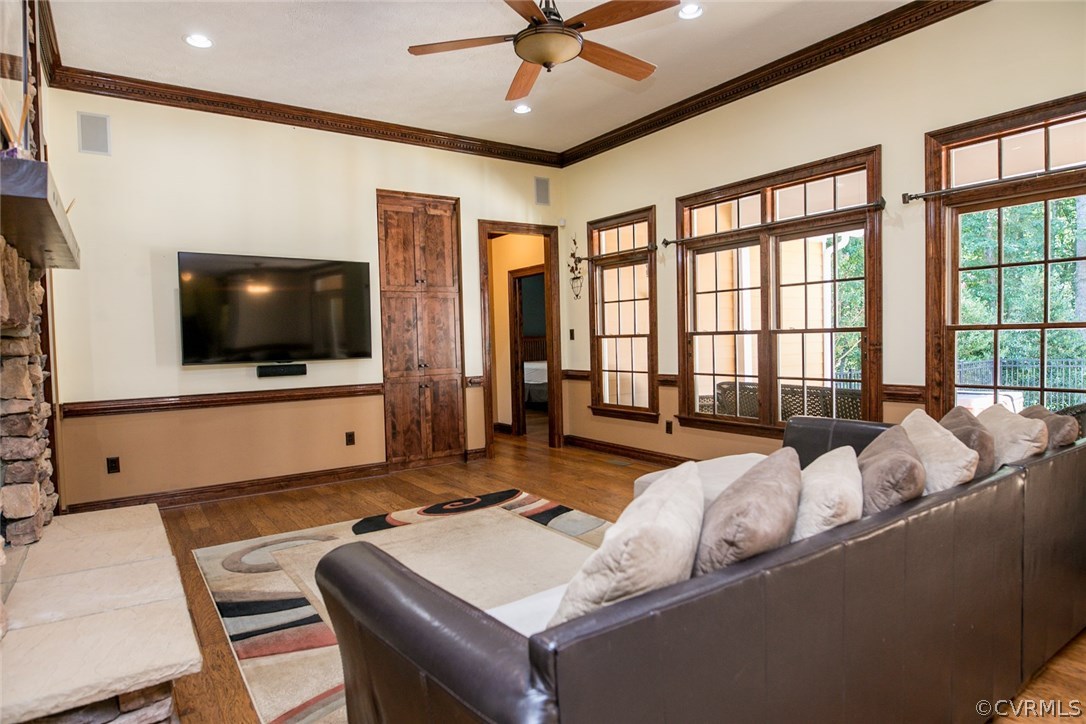 7365 Cedarcrest Road Hanover, VA 23069 - Photo 21 of 50 a living room with furniture and a flat screen tv