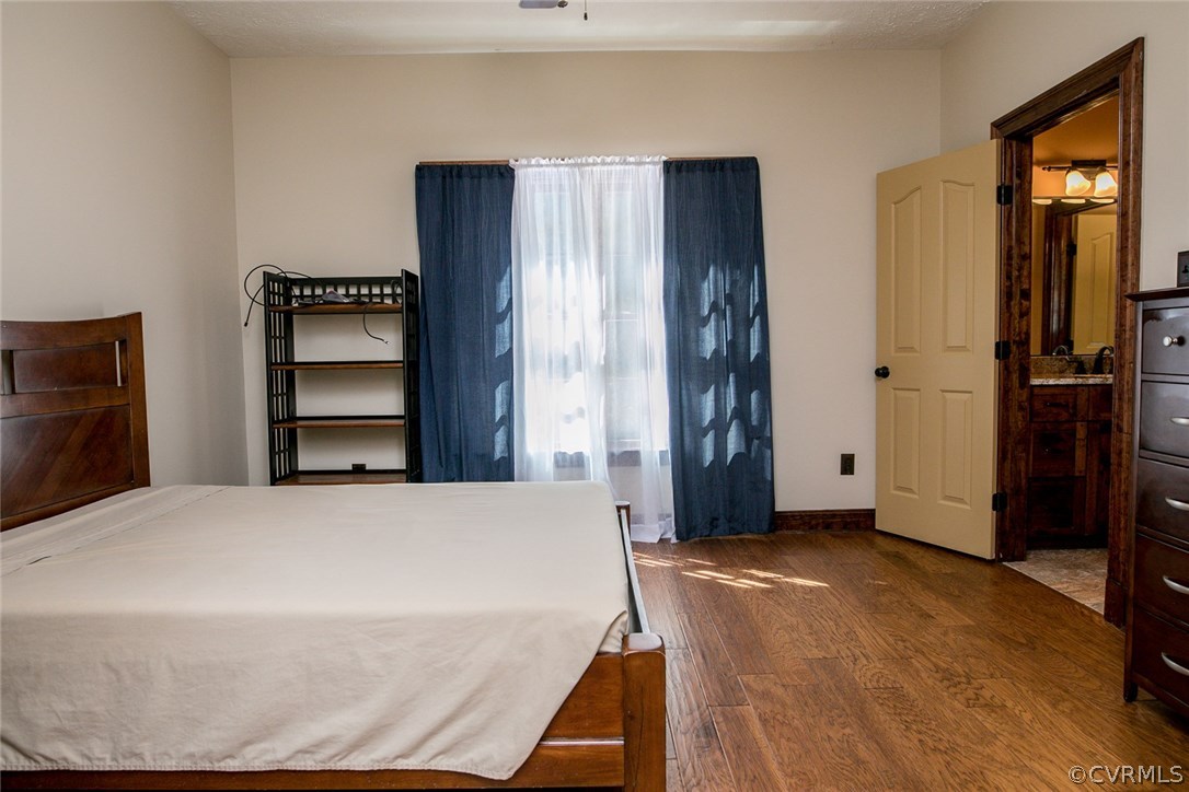 7365 Cedarcrest Road Hanover, VA 23069 - Photo 25 of 50 a bedroom with a bed and a large mirror