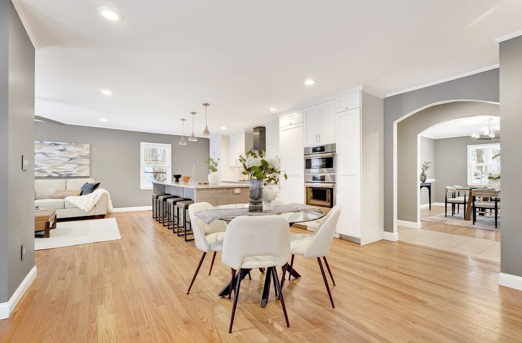 447 Waban Avenue Newton, MA 02462 - Photo 13 of 42 a view of a dining room with furniture and wooden floor