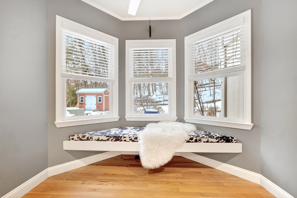 447 Waban Avenue Newton, MA 02462 - Photo 14 of 42 a bedroom with a bed and a window