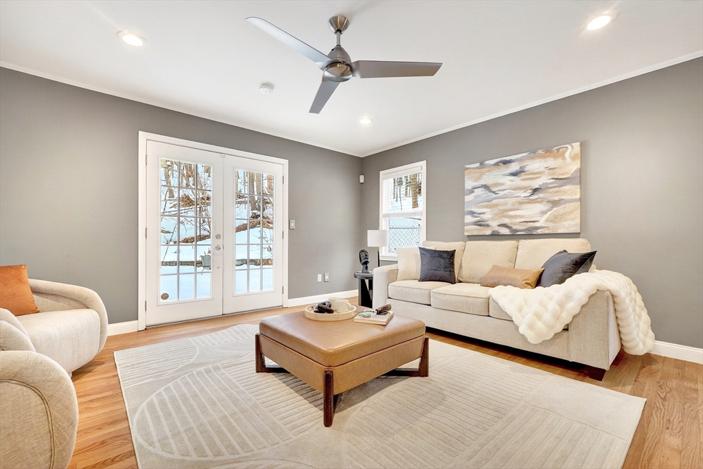 447 Waban Avenue Newton, MA 02462 - Photo 16 of 42 a living room with furniture and a large window