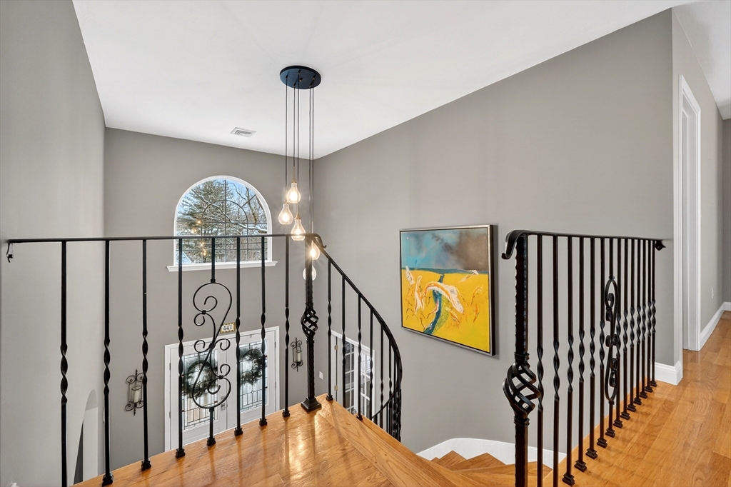 447 Waban Avenue Newton, MA 02462 - Photo 4 of 42 a view of entryway and hall with wooden floor