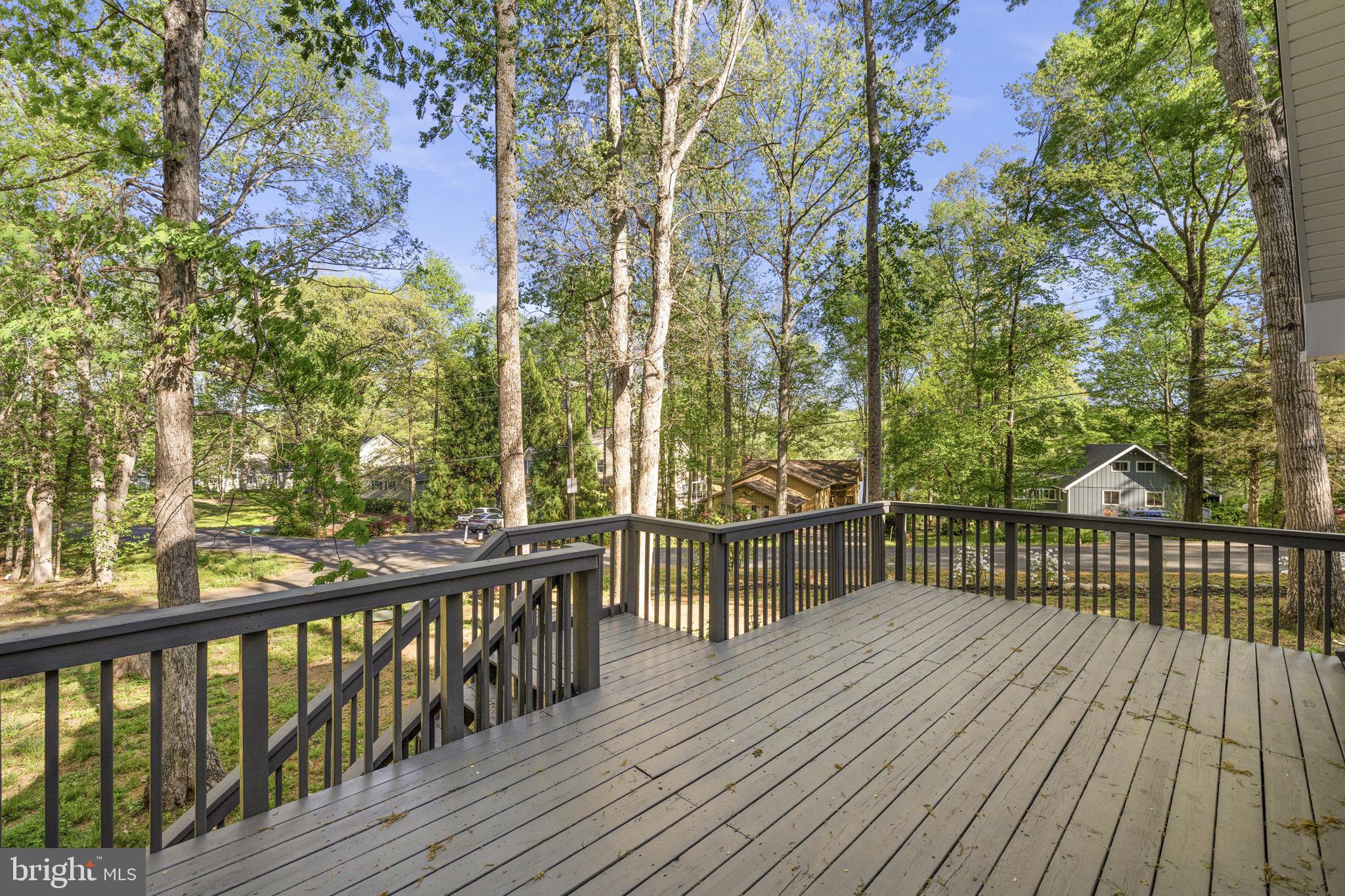 151 Harrison Circle Locust Grove, VA 22508 - Photo 22 of 83 a view of balcony with wooden floor and fence