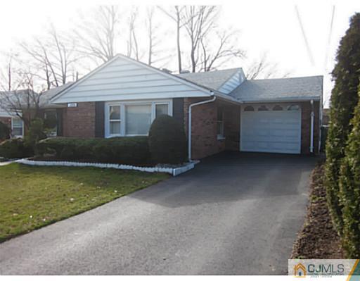 50 Gurley Road Edison, NJ 08817 - Photo 2 of 10 a front view of a house with garden