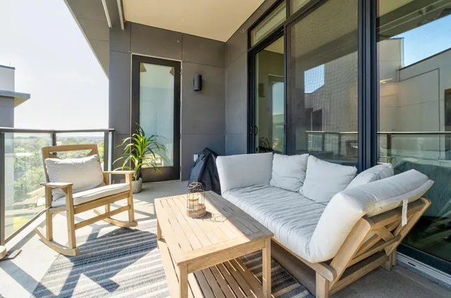 view of living room kitchen and patio