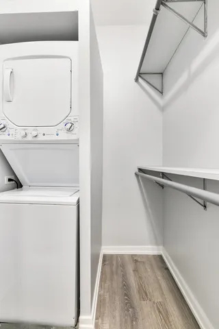a view of a storage & utility room with washer and dryer