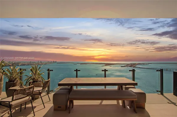 a view of a terrace with outdoor seating
