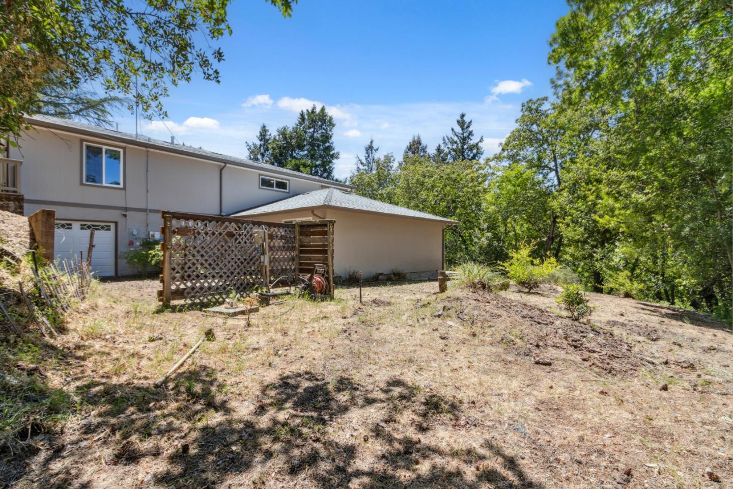24895 Skyland Road Los Gatos, CA 95033 - Photo 63 of 113 a view of a house with a yard