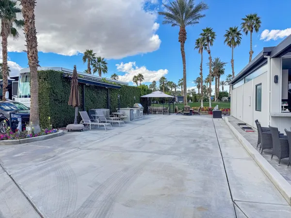 a view of a street with sitting area