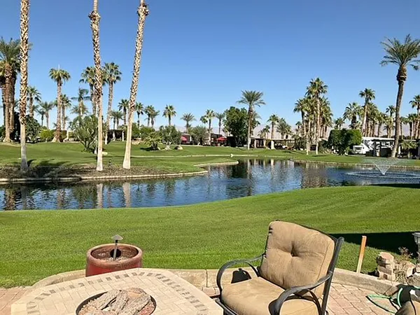a view of a lake with a house