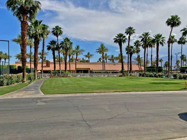 a view of a palm and entertaining space