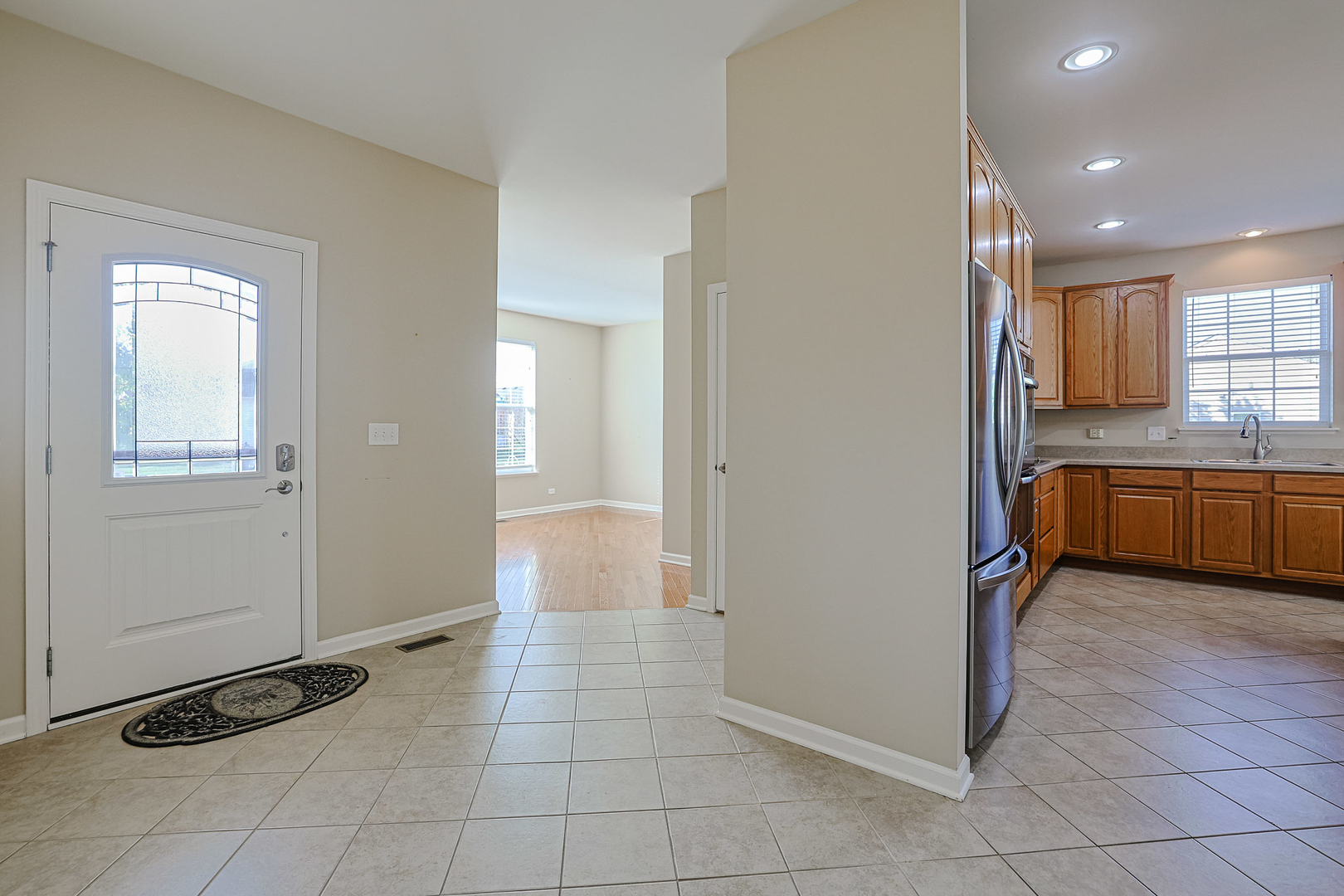 8800 Templeton Road Huntley, IL 60142 - Photo 13 of 31 a view of a kitchen with a sink and dishwasher cabinets