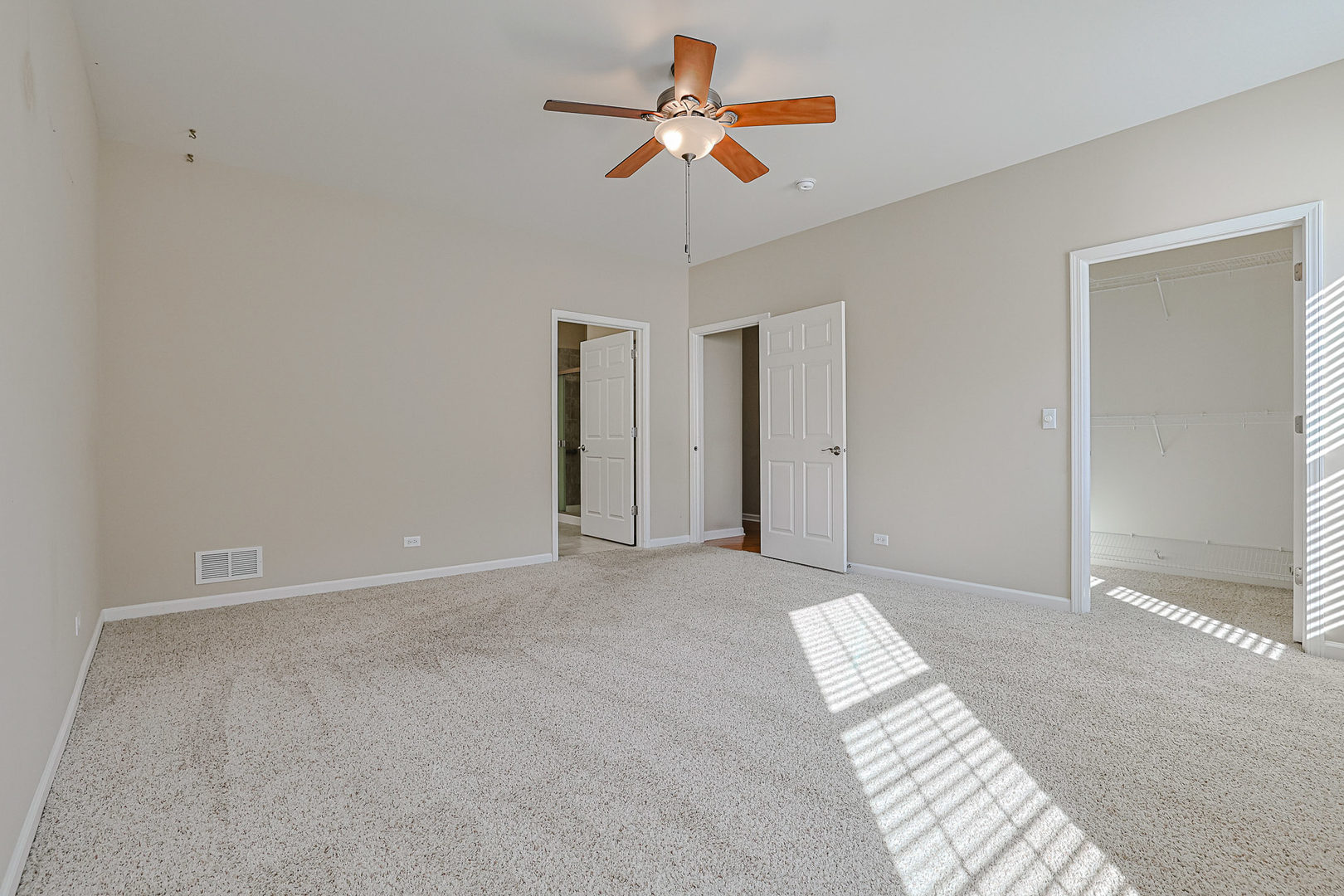 8800 Templeton Road Huntley, IL 60142 - Photo 18 of 31 a view of an empty room with a window