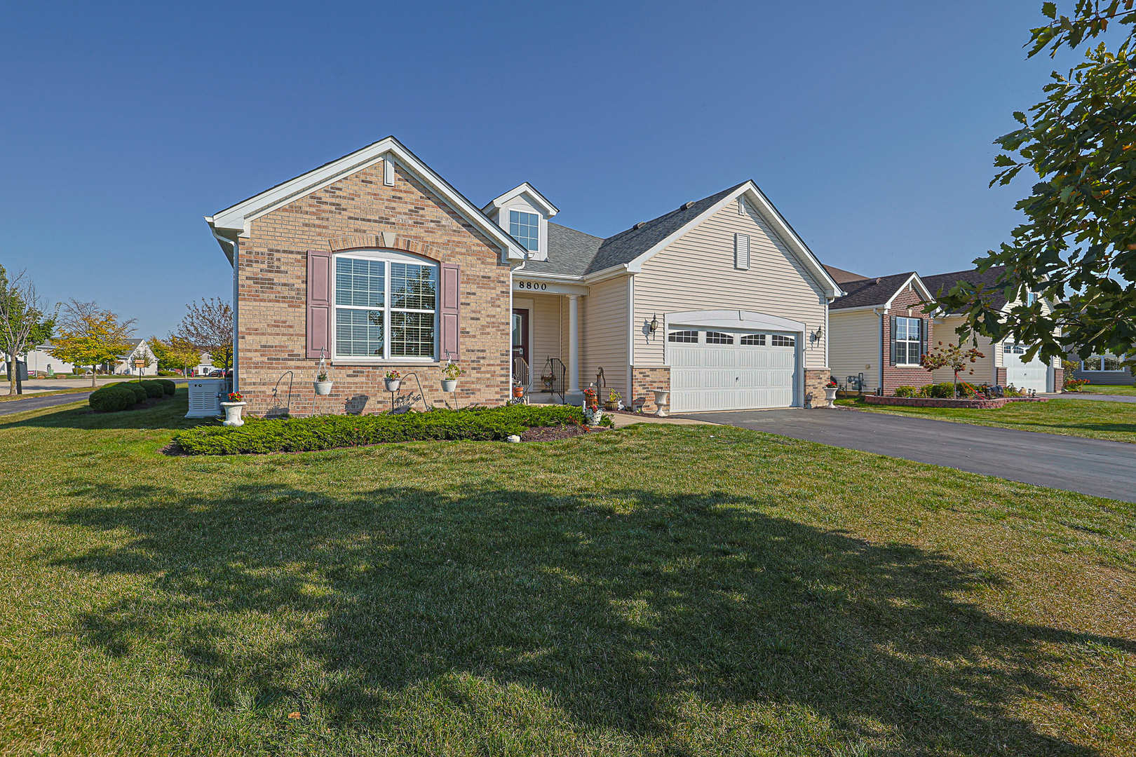 8800 Templeton Road Huntley, IL 60142 - Photo 2 of 31 a front view of a house with a yard