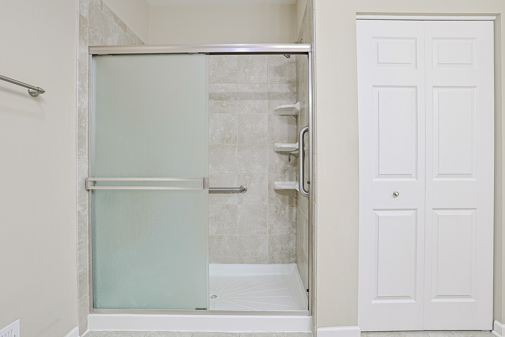 8800 Templeton Road Huntley, IL 60142 - Photo 21 of 31 a bathroom with a glass shower door