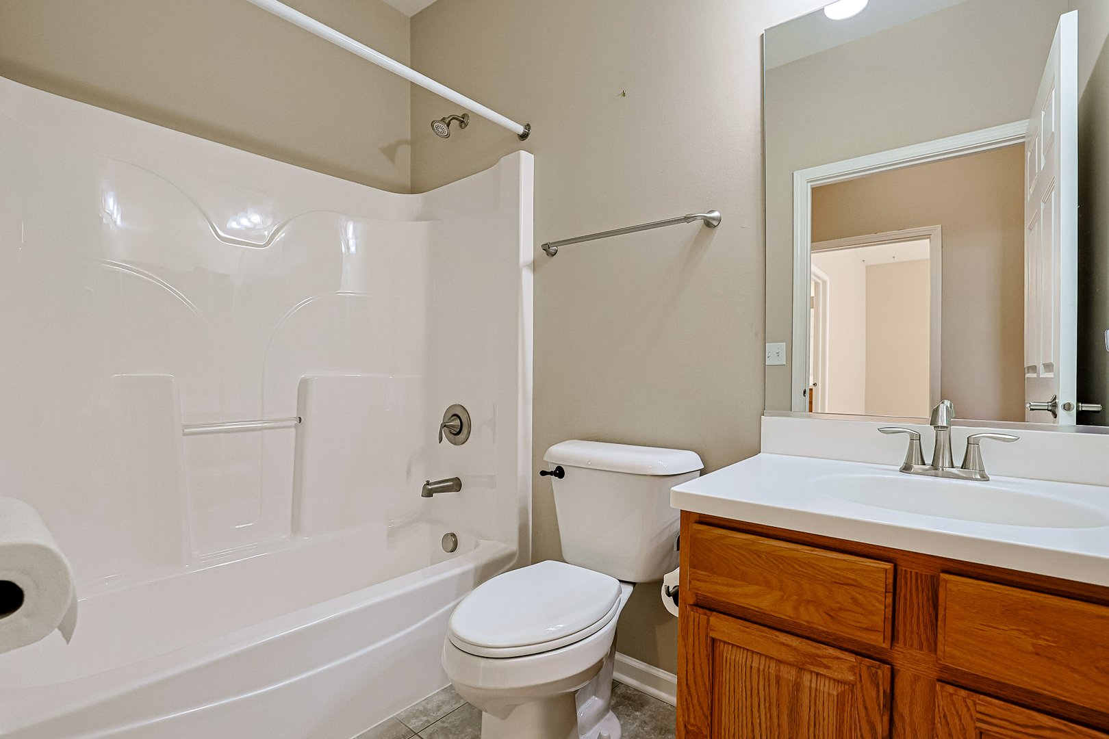 8800 Templeton Road Huntley, IL 60142 - Photo 24 of 31 a bathroom with a sink toilet and shower