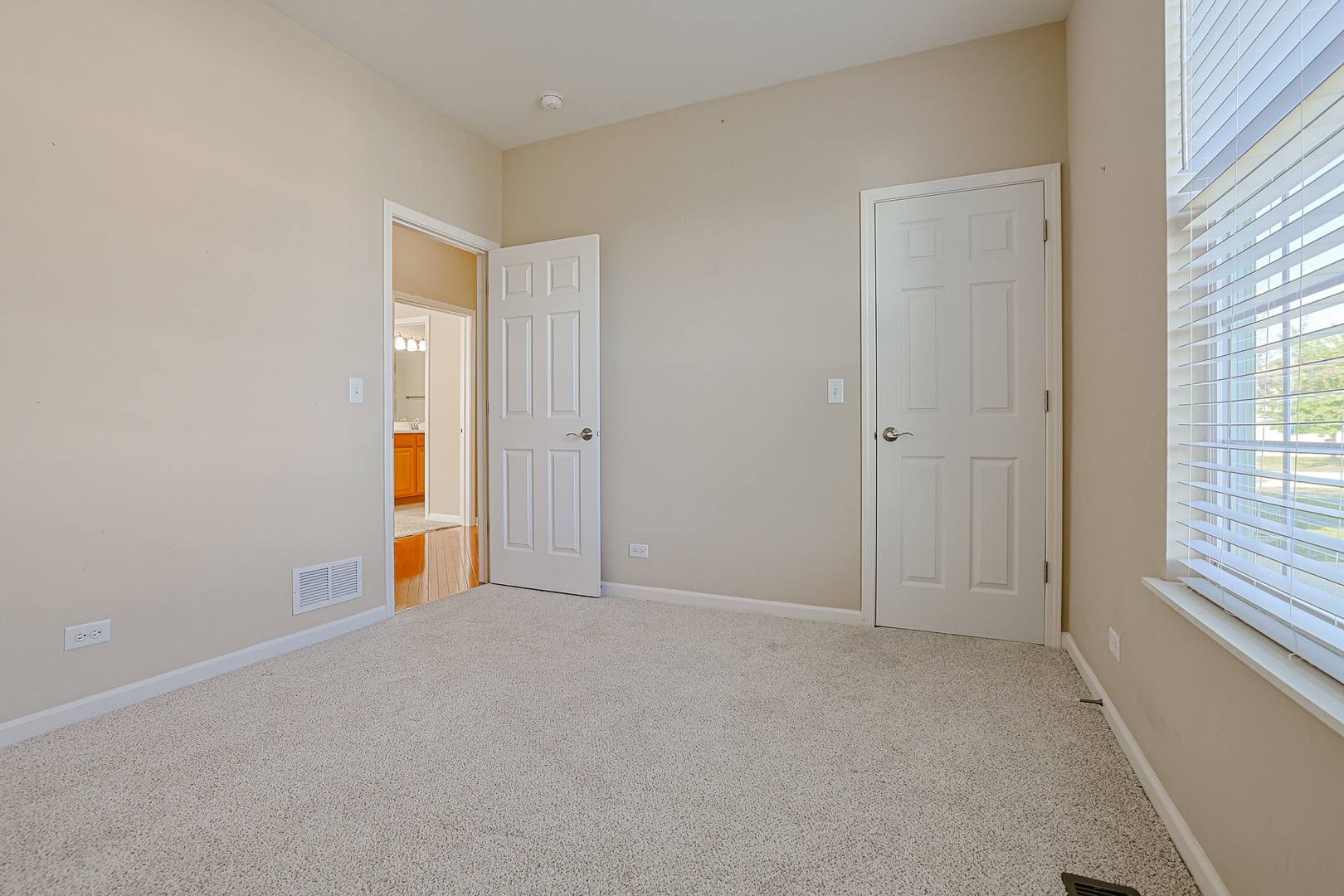 8800 Templeton Road Huntley, IL 60142 - Photo 26 of 31 a view of an empty room and a window
