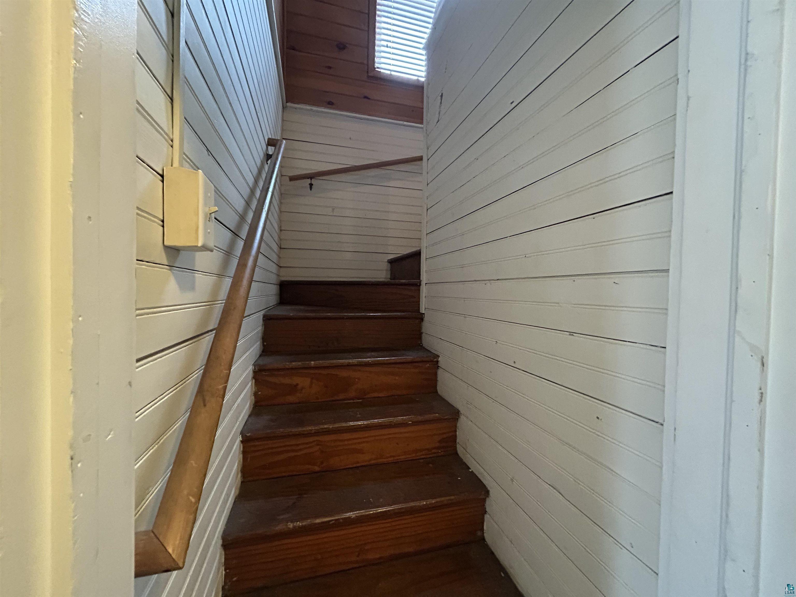 1723 East 4th Street Duluth, MN 55812 - Photo 20 of 47 Stairs with wooden walls