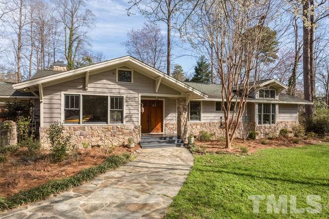 906 Runnymede Road Raleigh, NC 27607 - Photo 1 of 25 a front view of a house with yard outdoor seating and pathway
