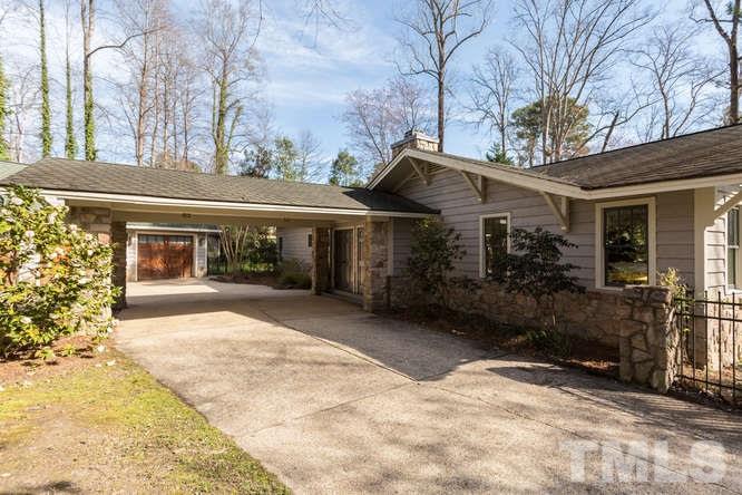 906 Runnymede Road Raleigh, NC 27607 - Photo 3 of 25 a front view of a house with garden