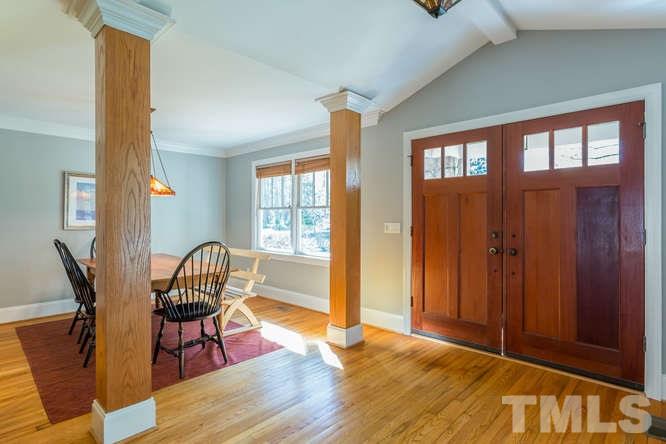 906 Runnymede Road Raleigh, NC 27607 - Photo 8 of 25 a view of a livingroom with furniture and windows