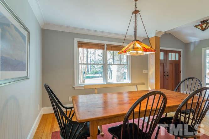 906 Runnymede Road Raleigh, NC 27607 - Photo 9 of 25 a dining room with furniture and window