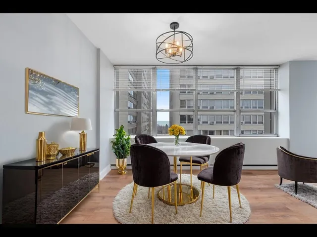 a view of a dining room with furniture