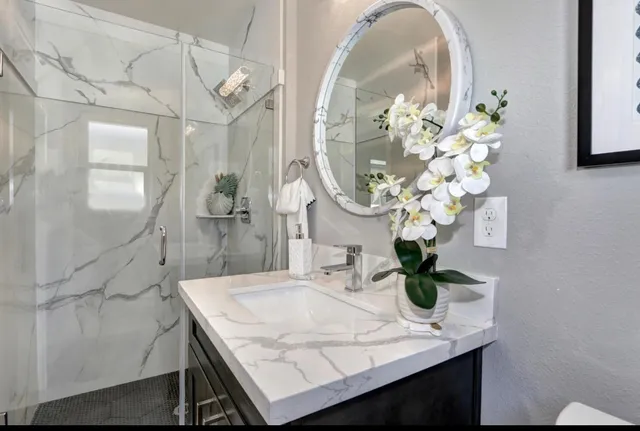 a front view of a house with a yard and a garage