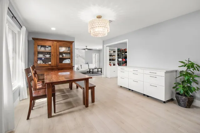 a bed room with a bed and a television