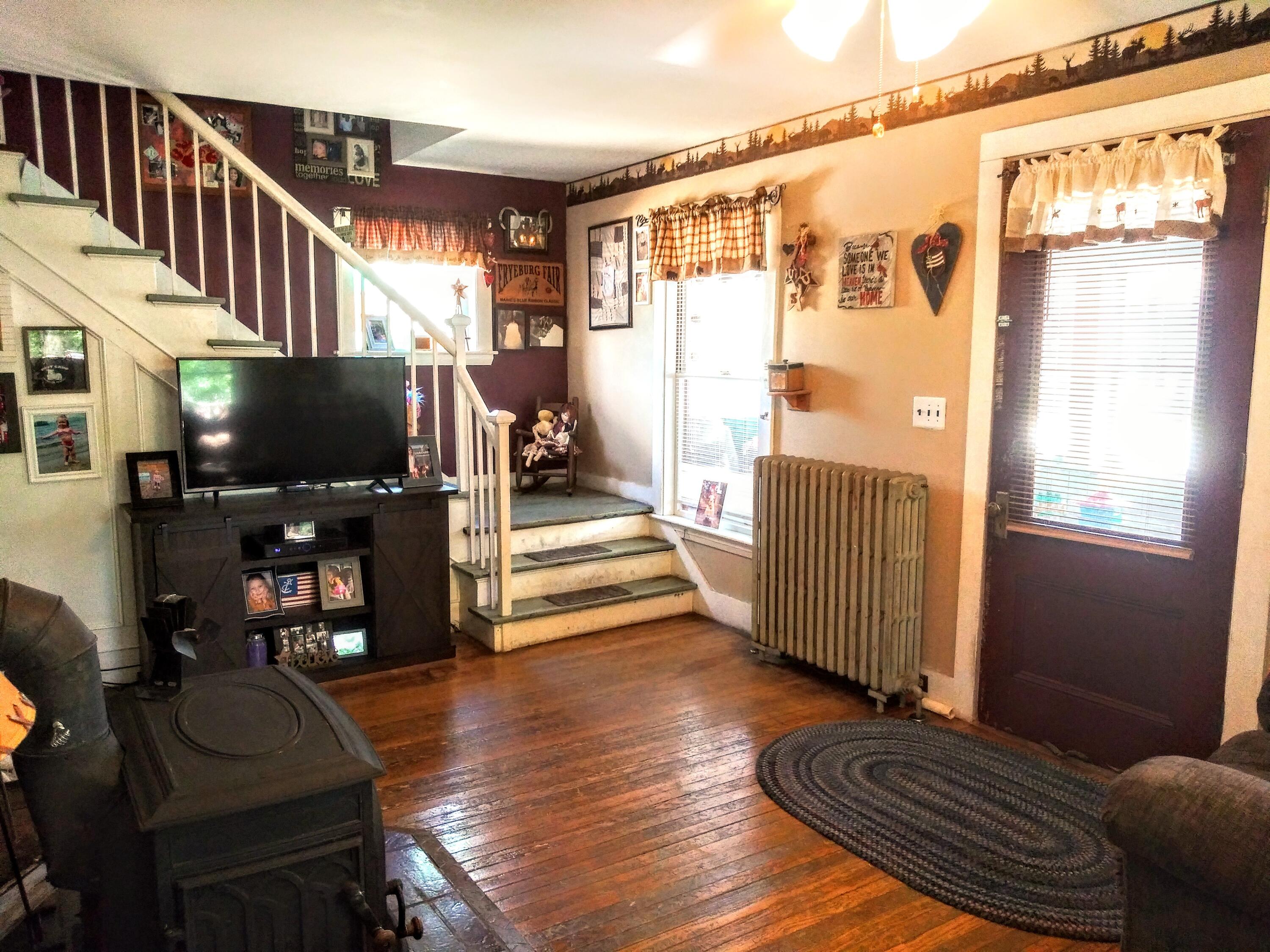 731 West Bethel Road Bethel, ME 04217 - Photo 21 of 33 Living room/staircase