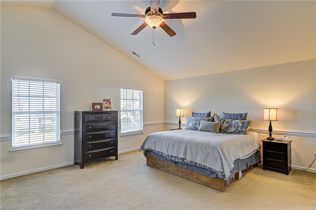 709 Spinning Wheel Point High Point, NC 27265 - Photo 23 of 41 Primary Bedroom with Vaulted Ceilings