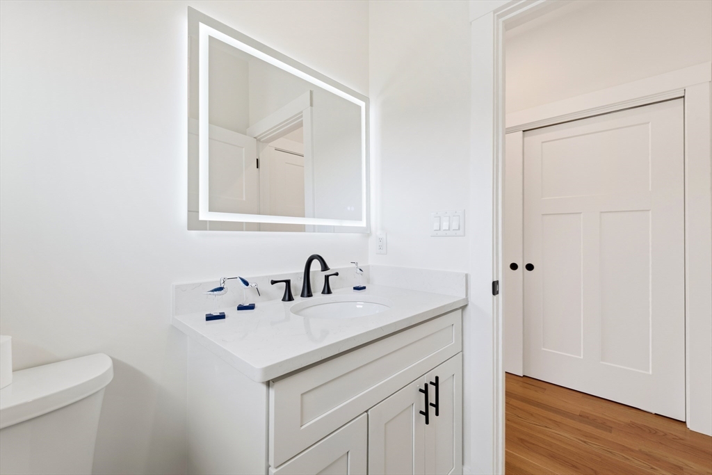 2 Old County Road, Unit 14 Salisbury, MA 01952 - Photo 16 of 33 a bathroom with a sink and a mirror