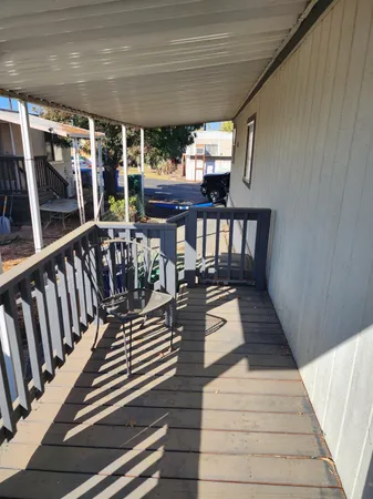 a view of balcony deck and patio