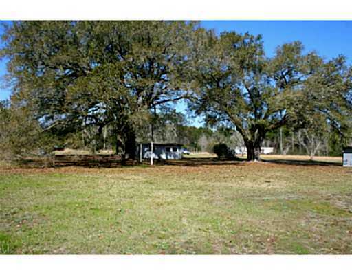 7701 Pointe Aux Chenes Road Ocean Springs, MS 39564 - Photo 1 of 13 Primary Photo