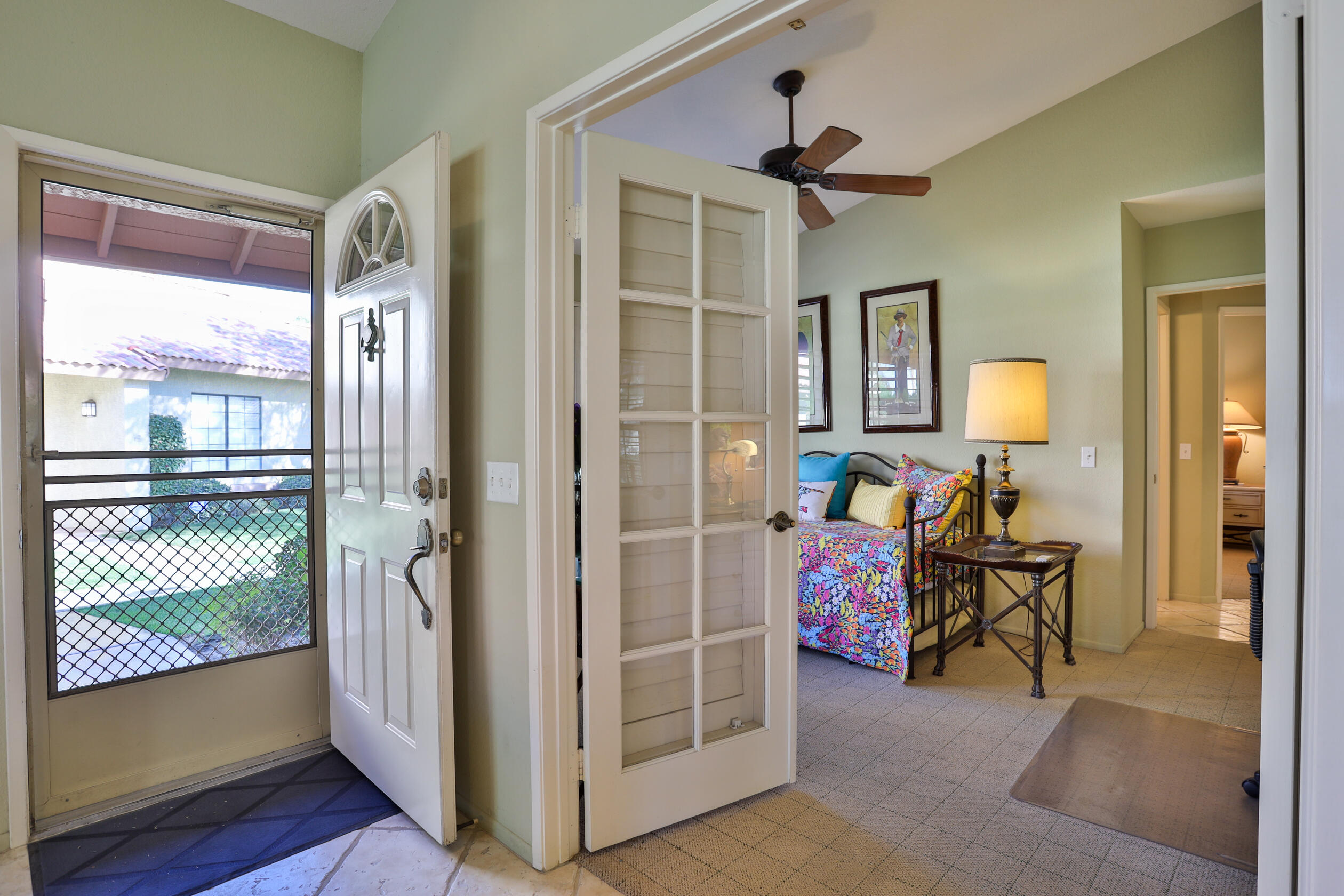 42895 Scirocco Road Palm Desert, CA 92211 - Photo 37 of 64 a bedroom with furniture and a window
