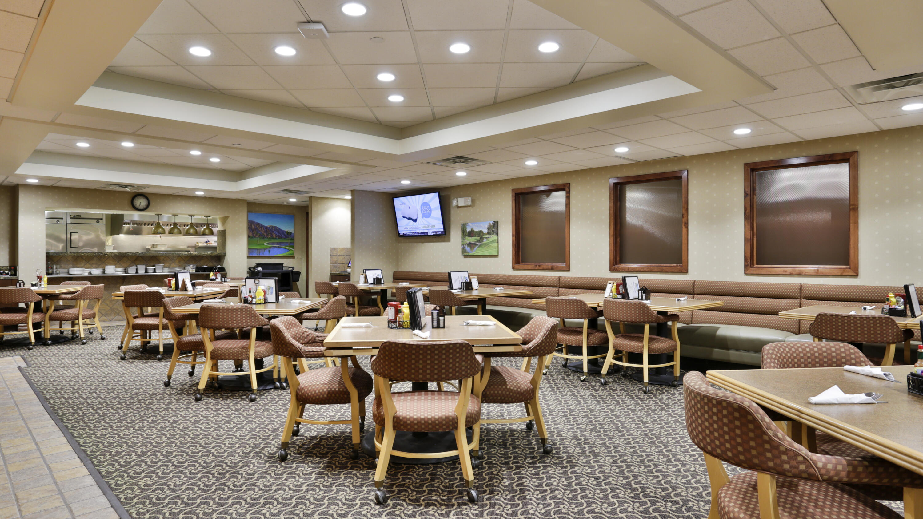 42895 Scirocco Road Palm Desert, CA 92211 - Photo 53 of 64 a group of people sitting in a living room