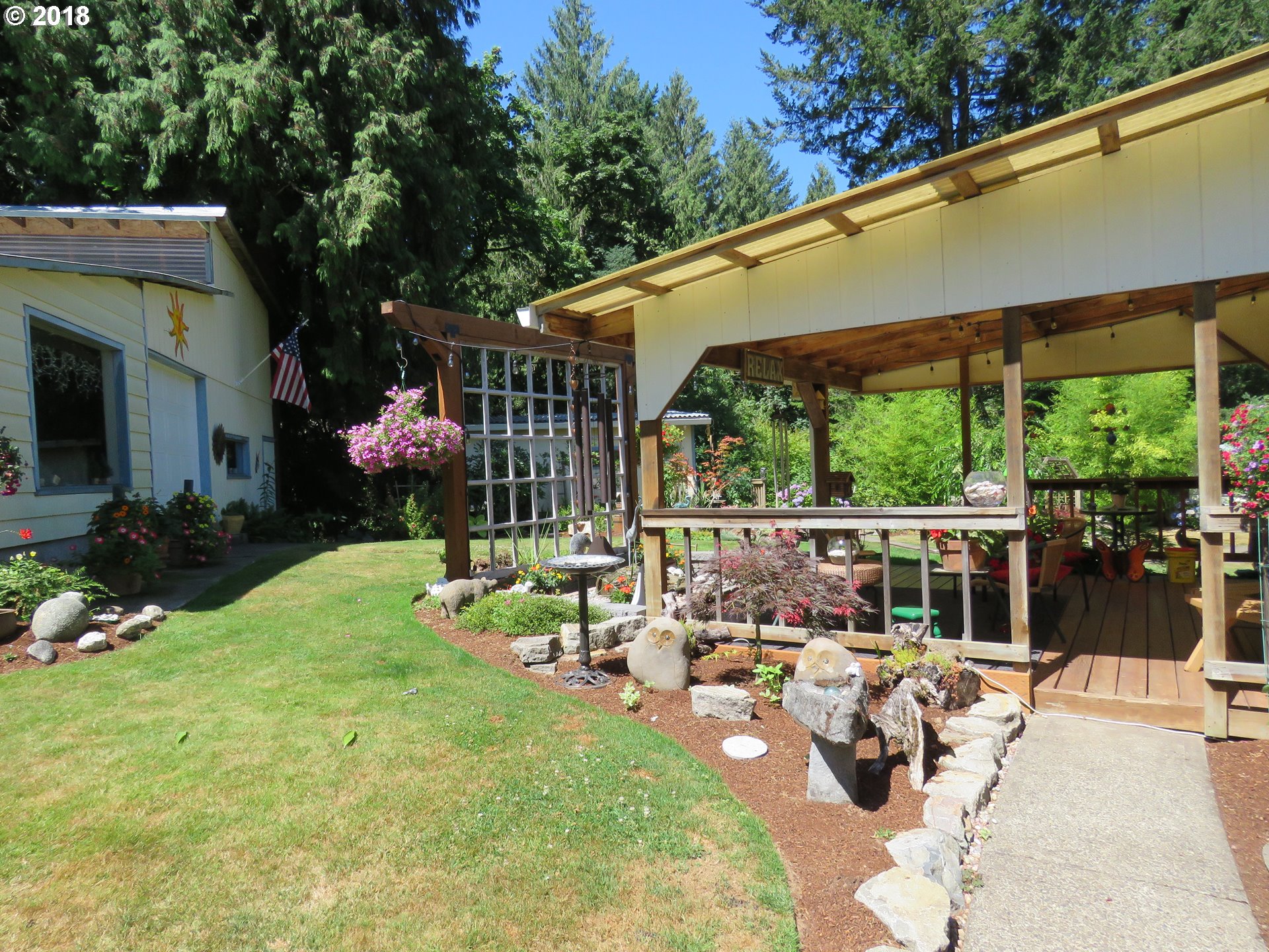 7635 Southeast Barbara Welch Road Portland, OR 97236 - Photo 20 of 26 a view of swimming pool with outdoor seating and plants