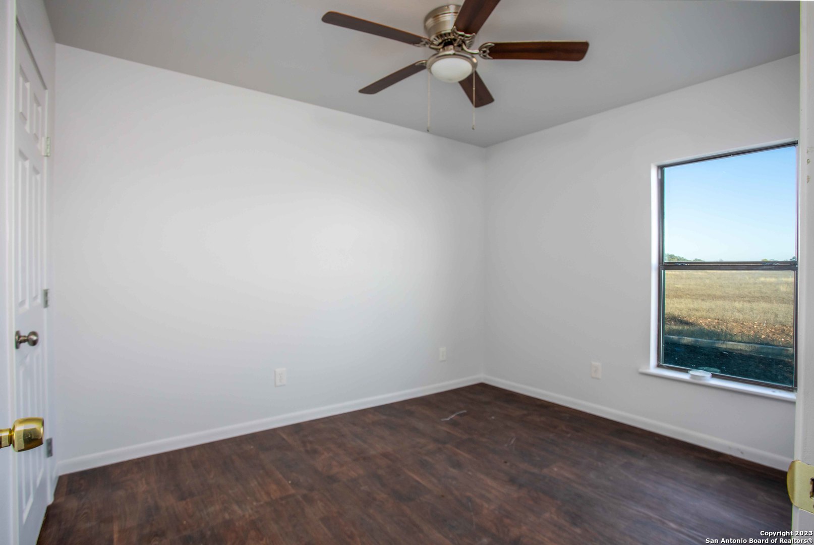 46 Fm 1621 Comfort, TX 78013 - Photo 13 of 48 an empty room with a window and a fan