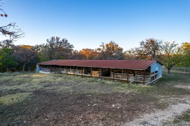 a house with trees in the background